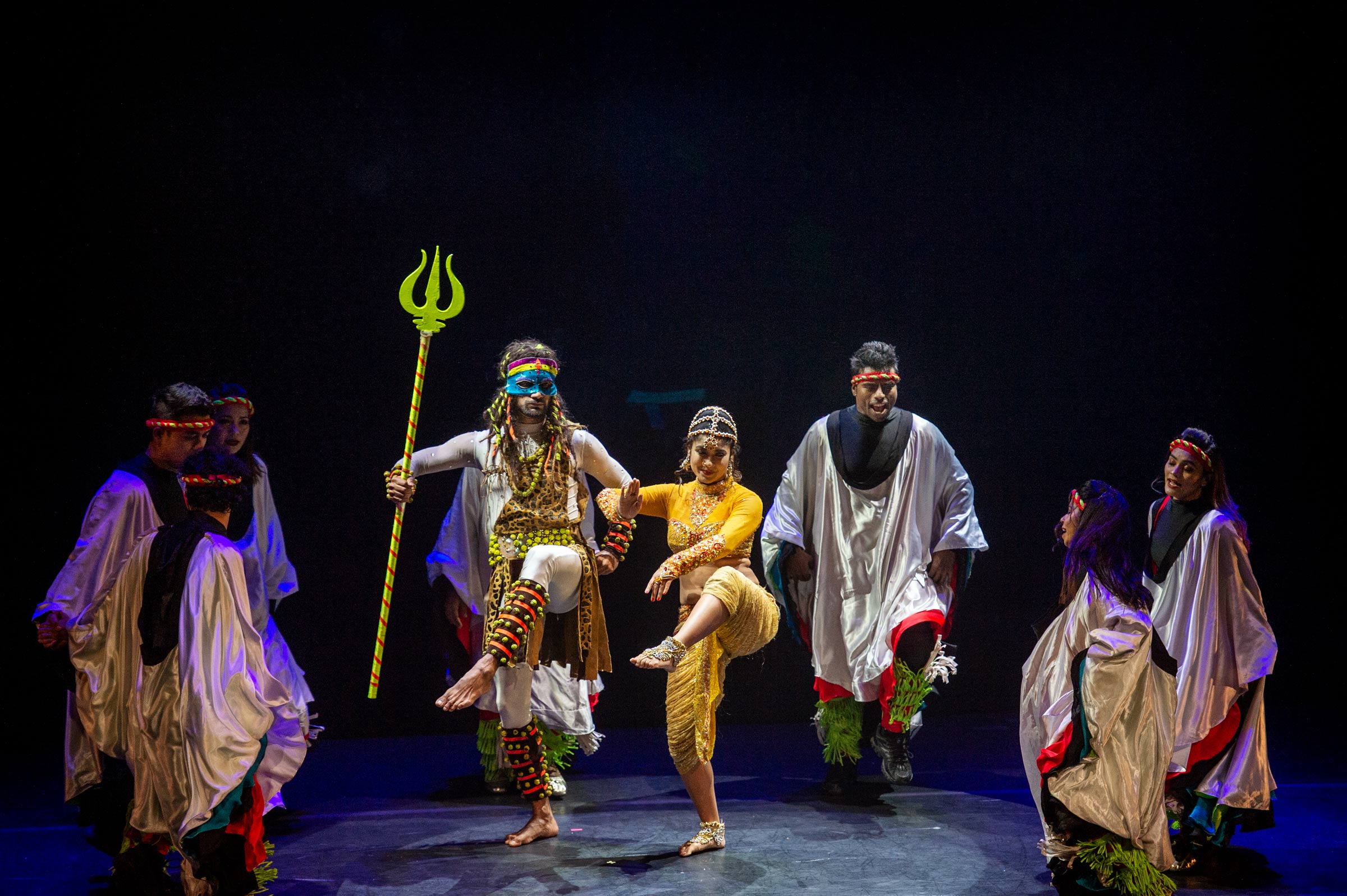 Bollywood performers dance on the Lyceum Series stage.