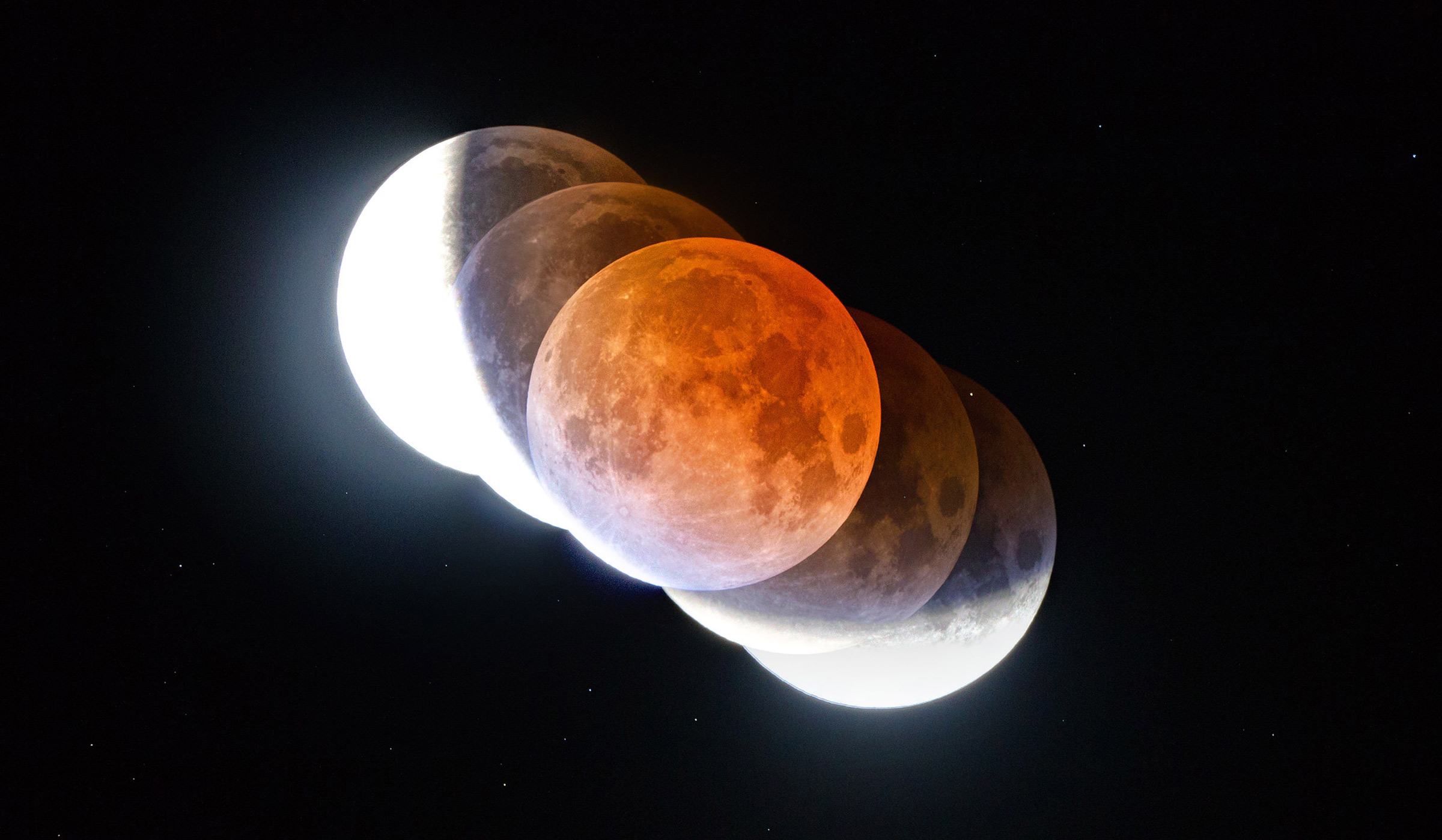Composite of five photos taken of the moon during the lunar eclipse, showing part of the moon inside the earth&#039;s shadow.