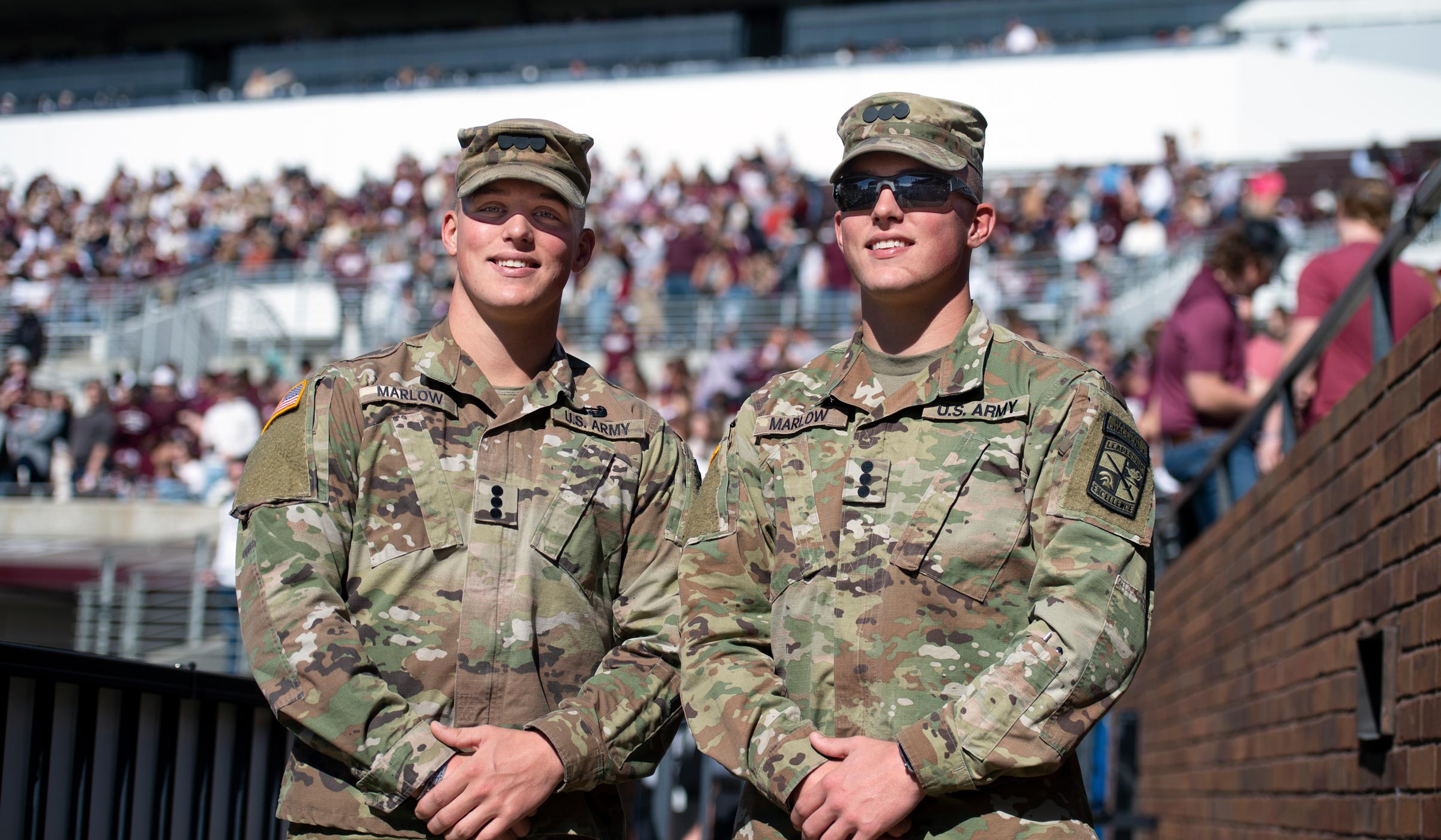 Colby and Cade Marlow, pictured in ARMY ROTC uniforms at an MSU football game.