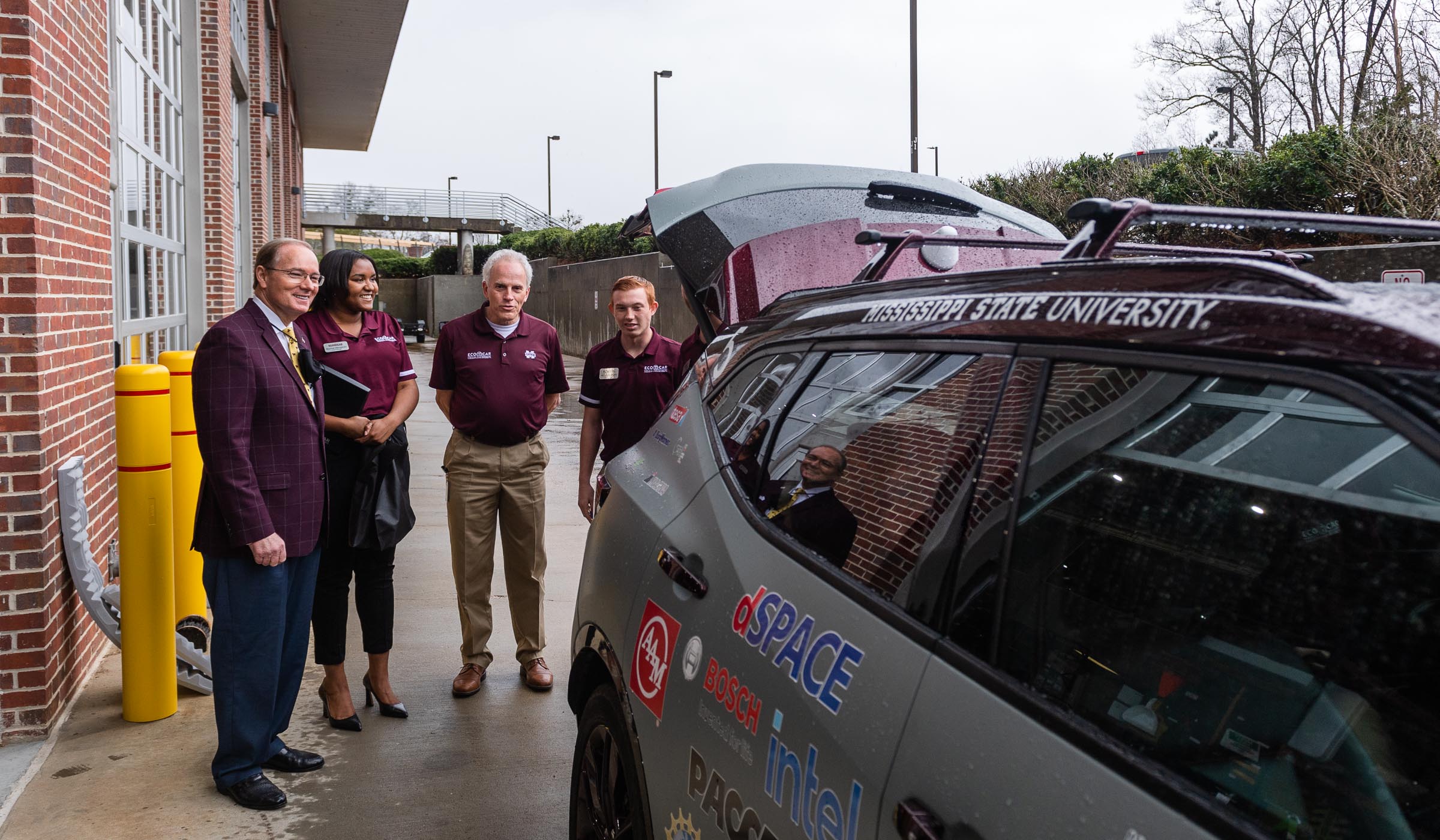 Dr. Keenum getting a tour of the EcoCAR, created by the EcoCAR Mobility Challenge Team.