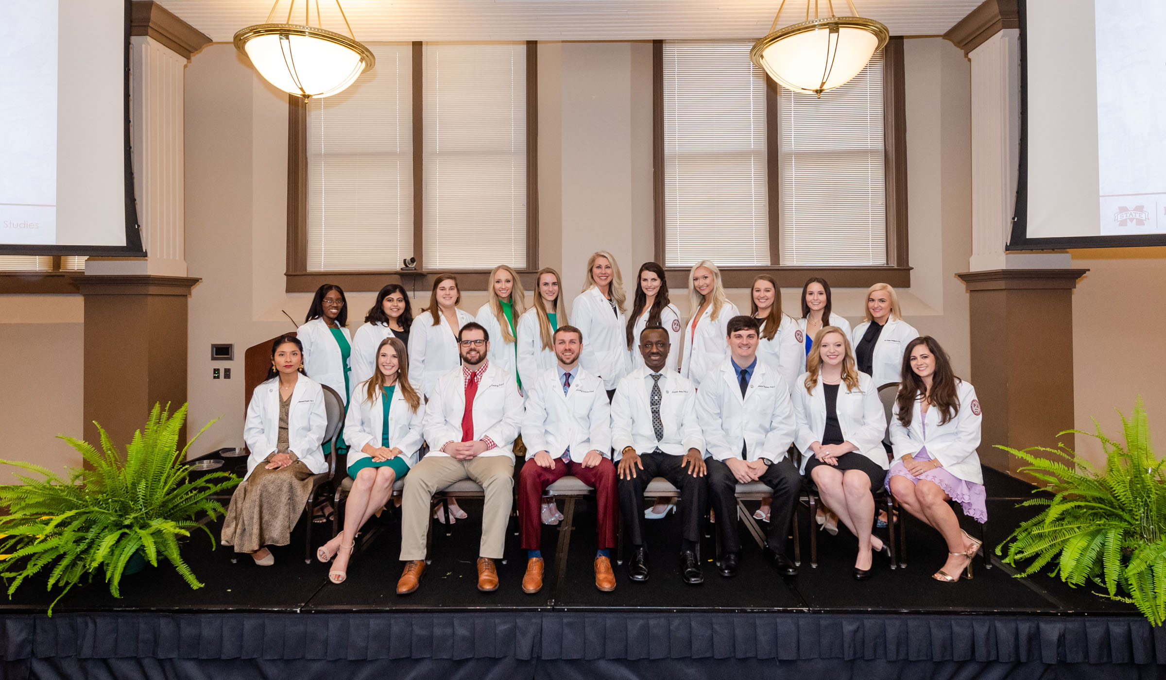 Physician Assistant Studies students receiving their white coats