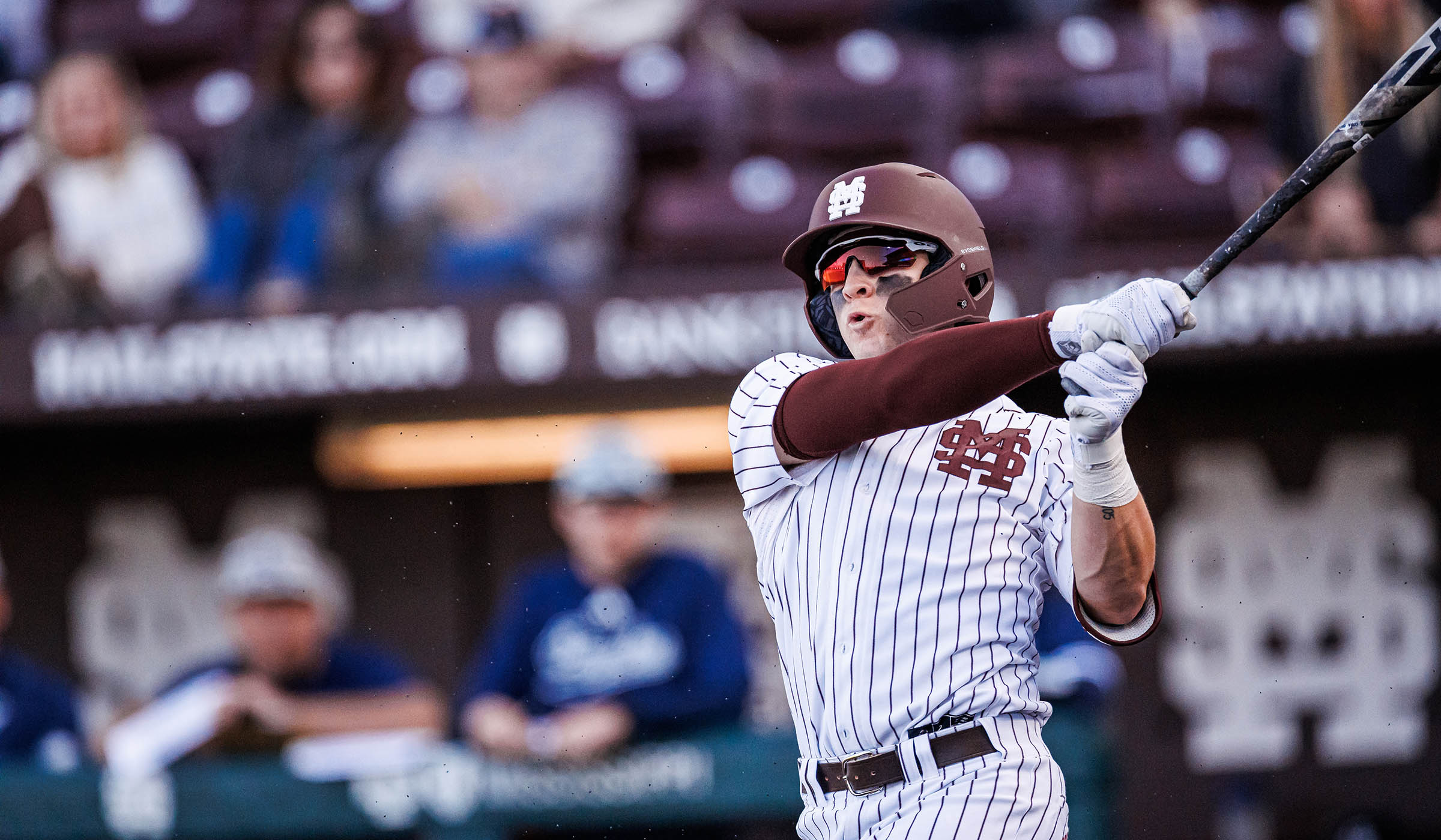 Joe Powell swings the bat during an MSU baseball game