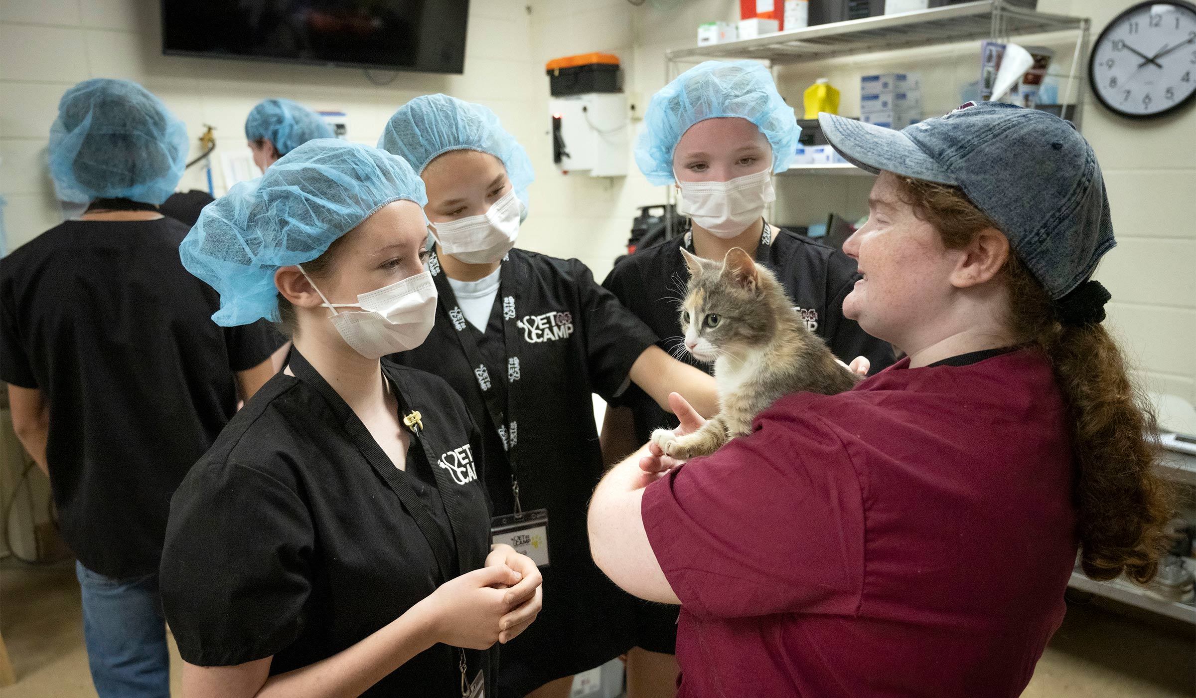 MSU Vet Camp participants listen to Jessica Styres of Madison, a Doctor of Veterinary Medicine student, as she explains the university’s Shelter Medicine program. Each