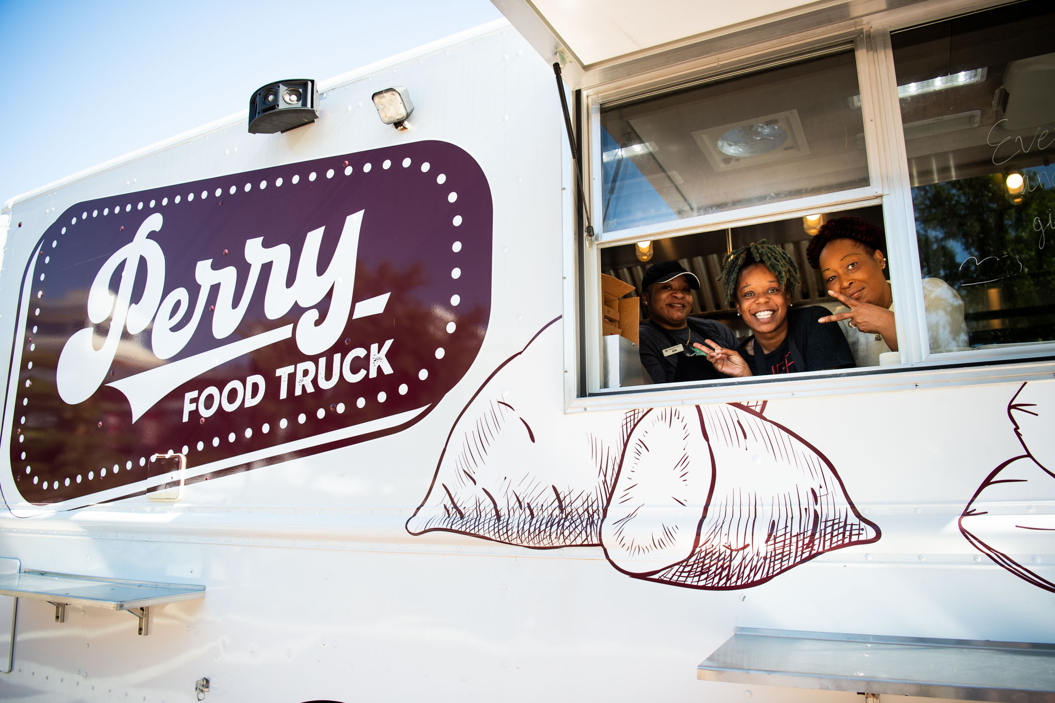 MSU Dining staff parks the Perry To-Go truck in the YMCA Plaza