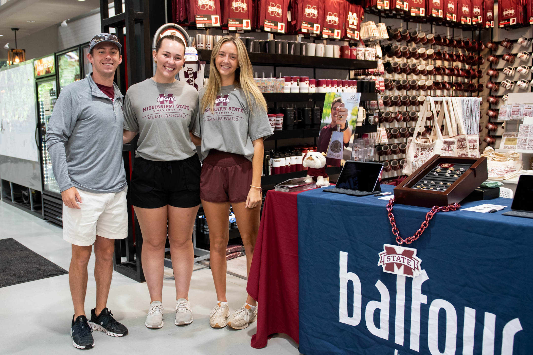 MSU Alumni Delegates, from left, Parker Kirby of Madison, Brianna Croft of Normal, Illinois and Josie Smith of Madison invite students to browse class ring options at Fall Ring Days, Sept. 18-20. The tabling event features various ring styles while teaching the tradition of class rings, how to find the right fit and the next steps to purchasing a little piece of history. Learn more about class rings and the MSU Alumni Association by visiting here.