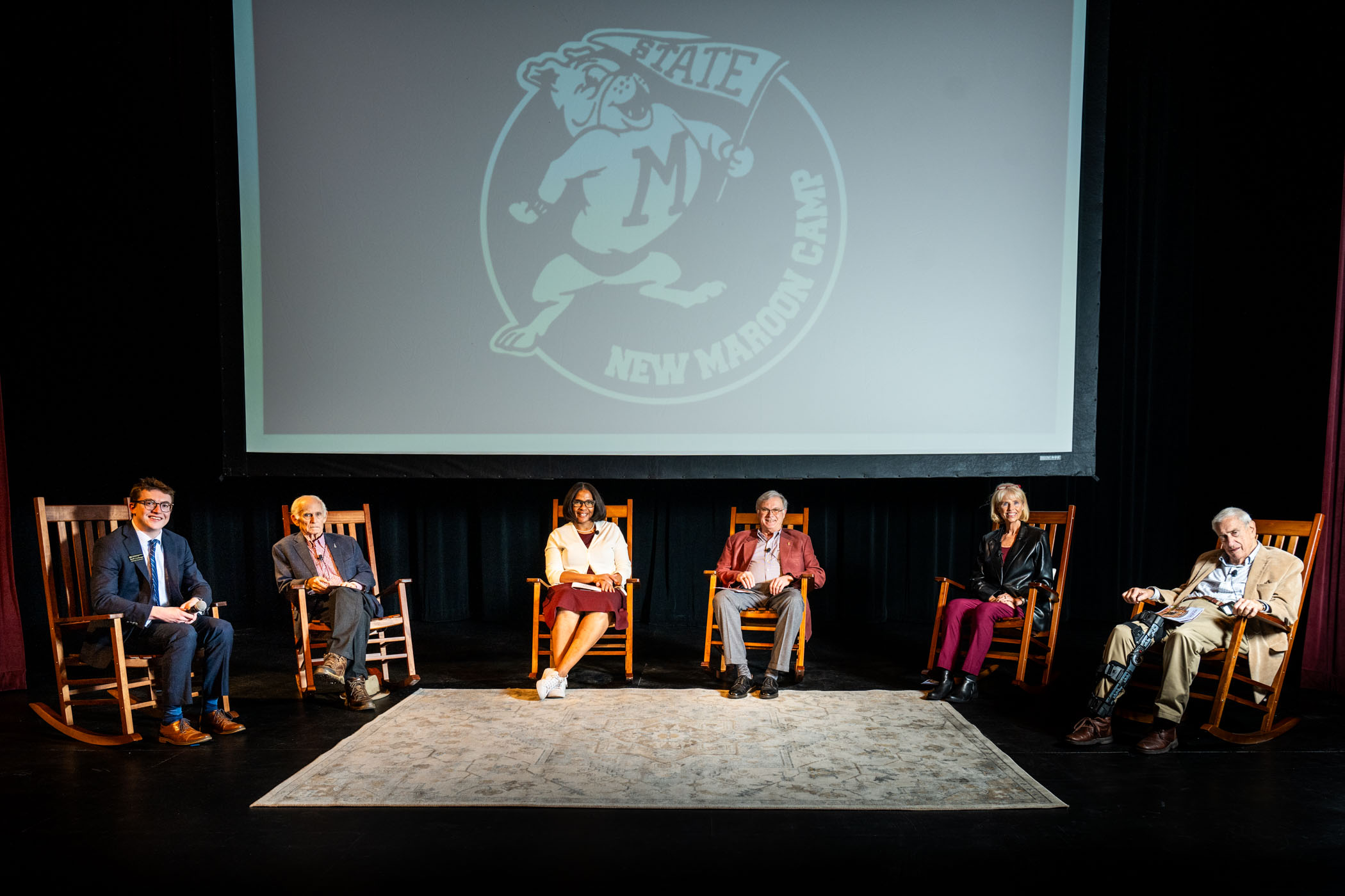 New Maroon Camp hosts an evening with MSU legends, including (L to R,) former Student Association President Travis Clark, current MSU Executive Director of Student-Athlete Development Ann Carr, retired Associate Dean of Students Eddie Keith, retired MSU Women’s Basketball Coach Sharon Fanning, and MSU Interim President and longtime Student Affairs administrator Roy Ruby, in Bettersworth Auditorium. The panel style discussion, led by NMC's outreach coordinator Jacob Linebarger, gave current students insight