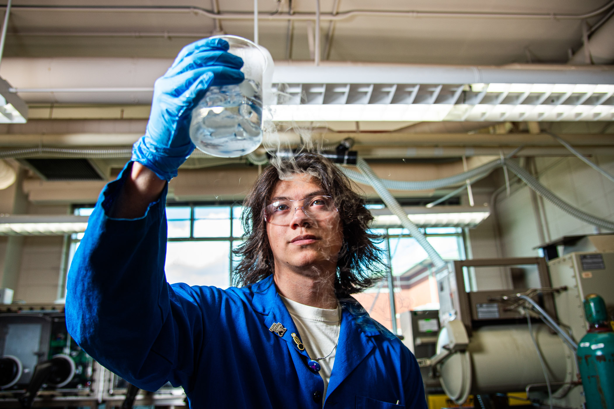 Chandler Woo in a chemistry lab