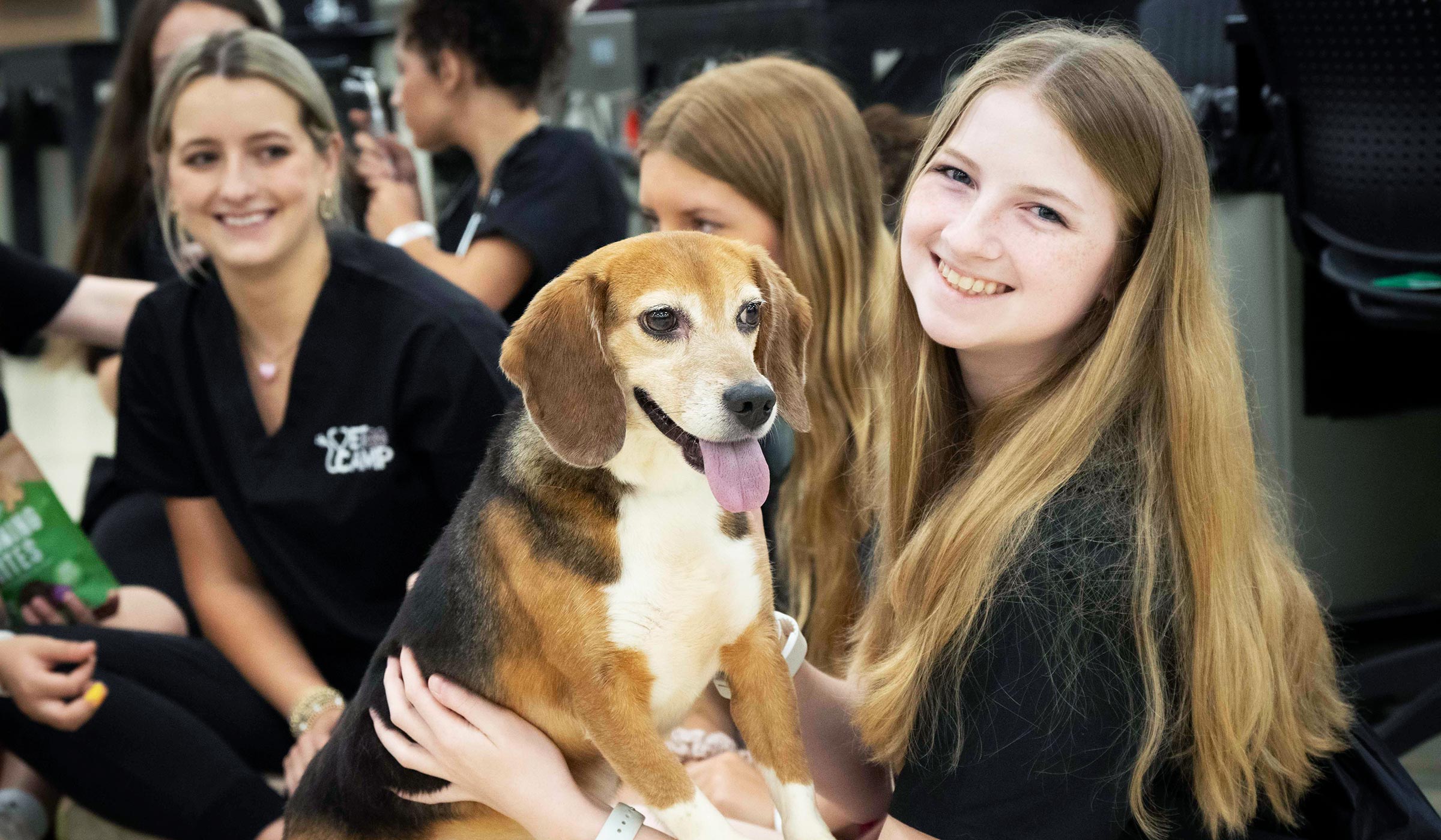 Vet school camper with canine before exam