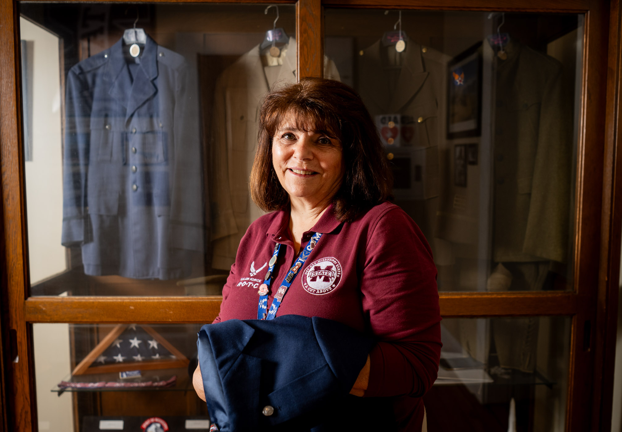 lady in front of a glass case