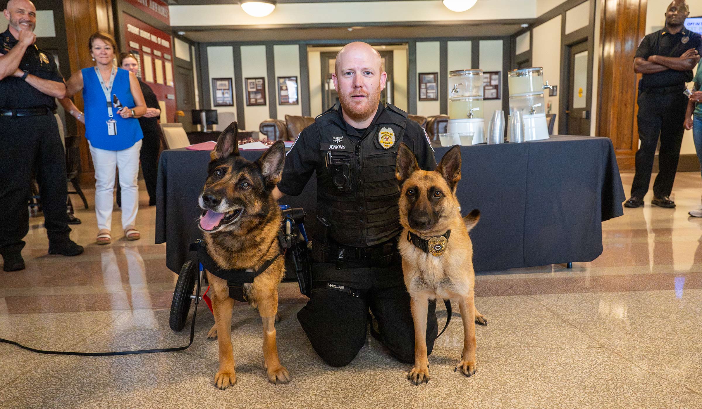 K9 Migel, Sgt. Patrick Jenkins, and K9 Padi