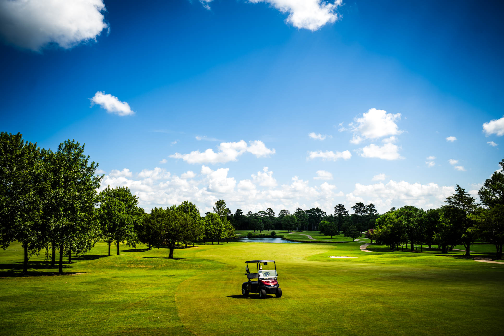 One of MSU's new golf carts sits in the center of the fairway under a bright mid morning sky on Tuesday [July 22]. These new carts better serve Starkville's community of golfers as they take on 18 holes at one of the SEC's most prestigious courses. 