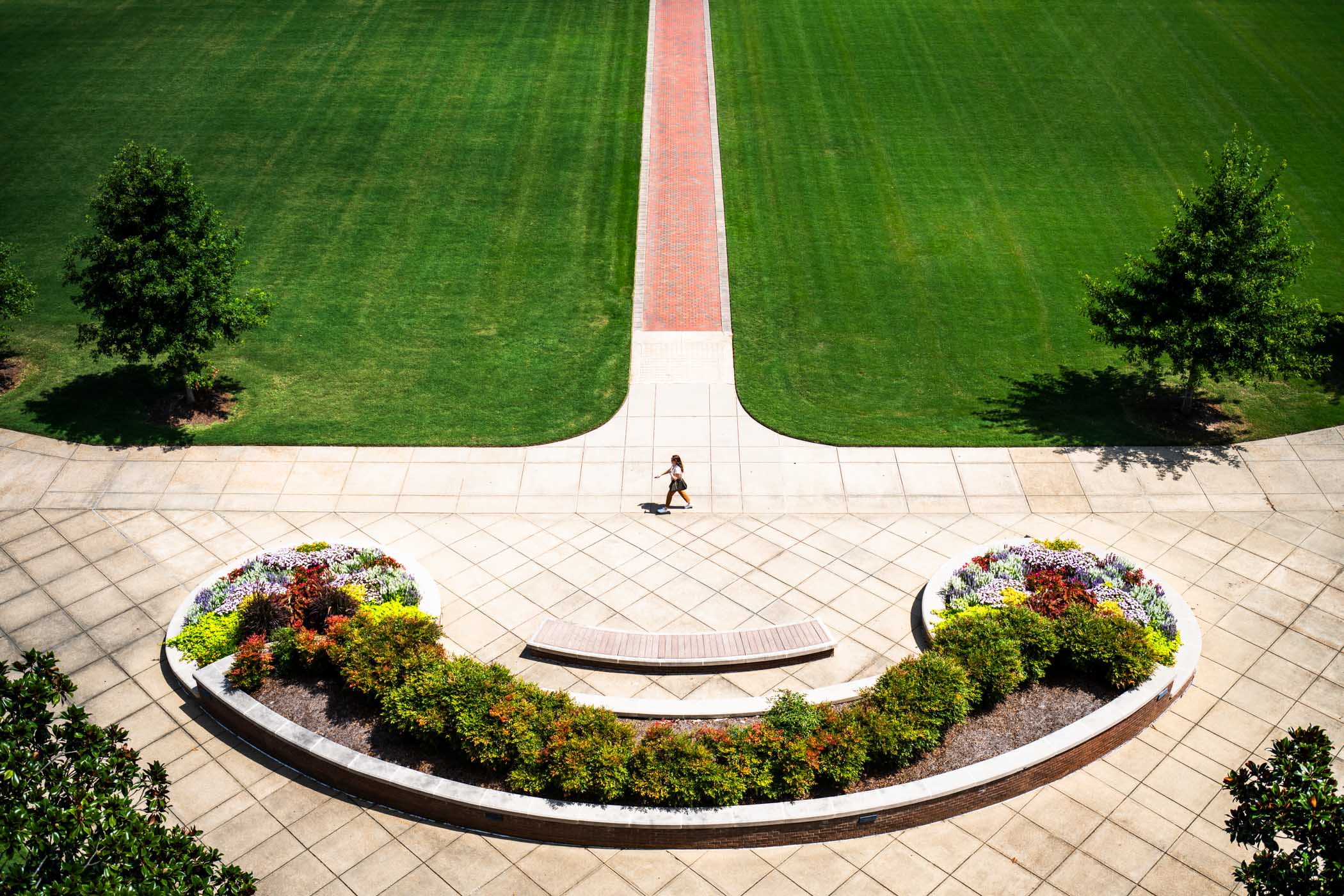 A Mississippi State student walks across the end of the university’s historic Drill Field this week in front of Swalm Chemical Engineering Building 