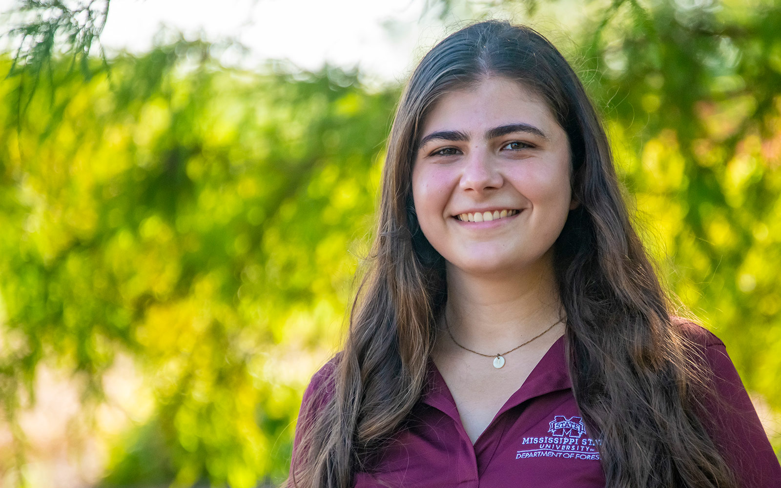girl in maroon shirt