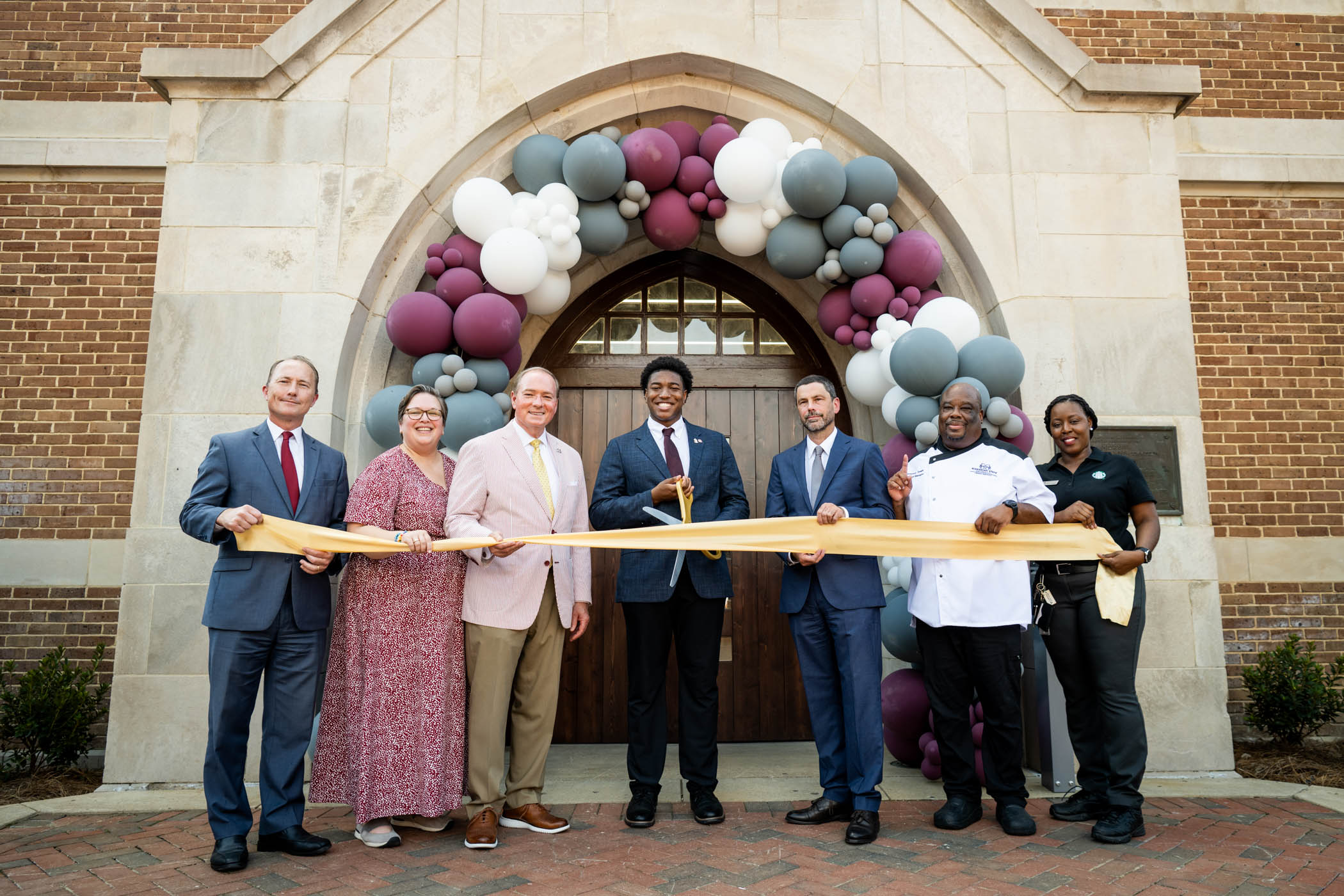 Mississippi State and Aramark officials cut the ribbon Friday [Aug. 15] to celebrate the grand opening of Perry Food Hall. Built in 1921, the iconic space has been carefully renovated to preserve its historic character while introducing new dining options for today’s Bulldogs. From 1921 Café and Bark Grill to The Beet Drop, Moe’s Southwest Grill and the State Fountain Bakery, the hall blends tradition with a fresh campus experience. 