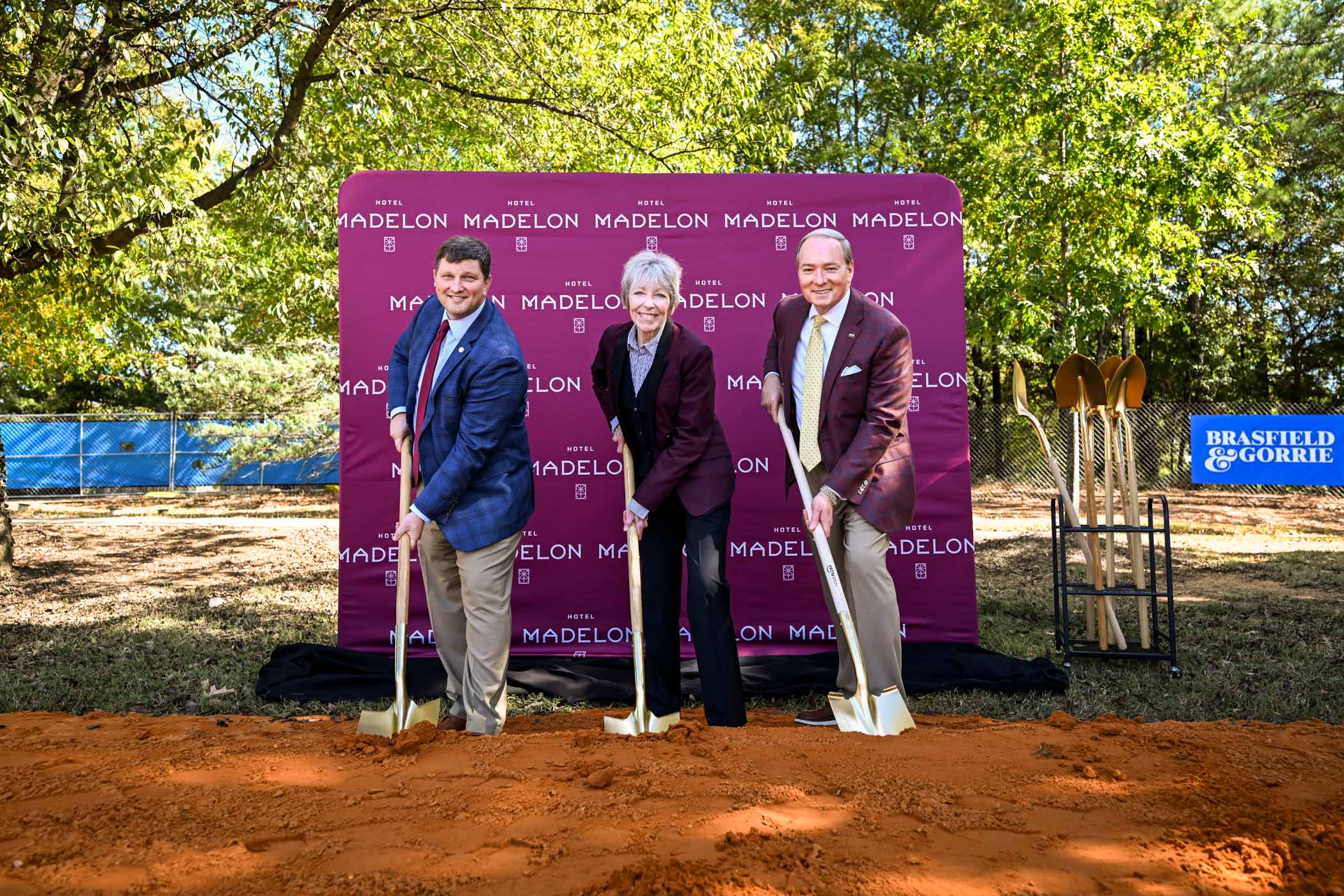 From left, Mississippi State Foundation President and CEO John Rush, Starkville Mayor Lynn Spruill and MSU President Mark E. Keenum celebrate the groundbreaking of Hotel Madelon, a swanky new place to stay. The hotel, which features a 122-room Marriott Tribute Portfolio hotel, along with a full-service restaurant, rooftop bar and dedicated underground parking, will anchor the new Crossroads District development between the university and the Cotton District.