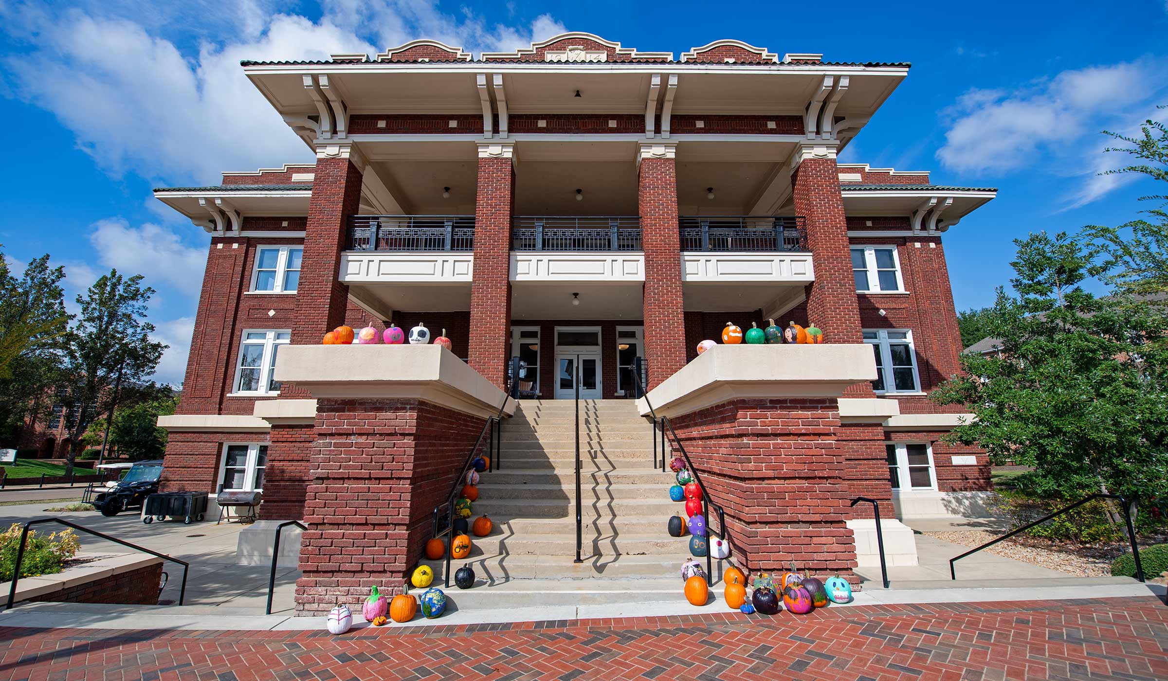 Pumpkins from the MSU Student Association decorate the steps of the YMCA Building as the first week of October brings cooler temperatures before students go on Fall Break [Oct. 9-12]. 