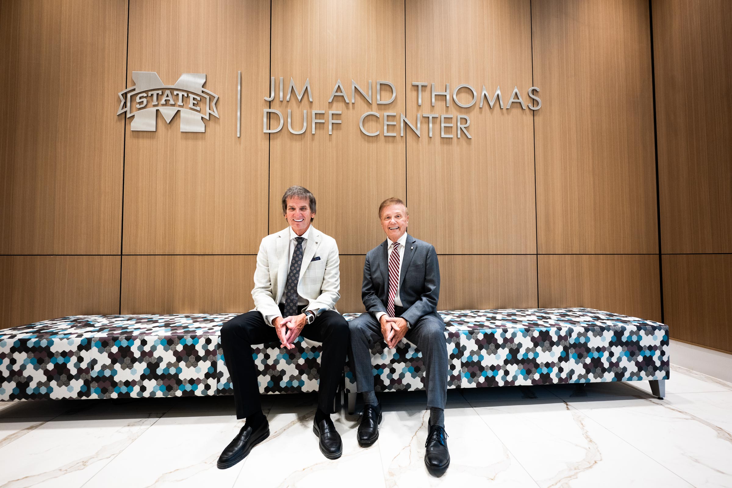 two men sit at Jim and Thomas Duff Center