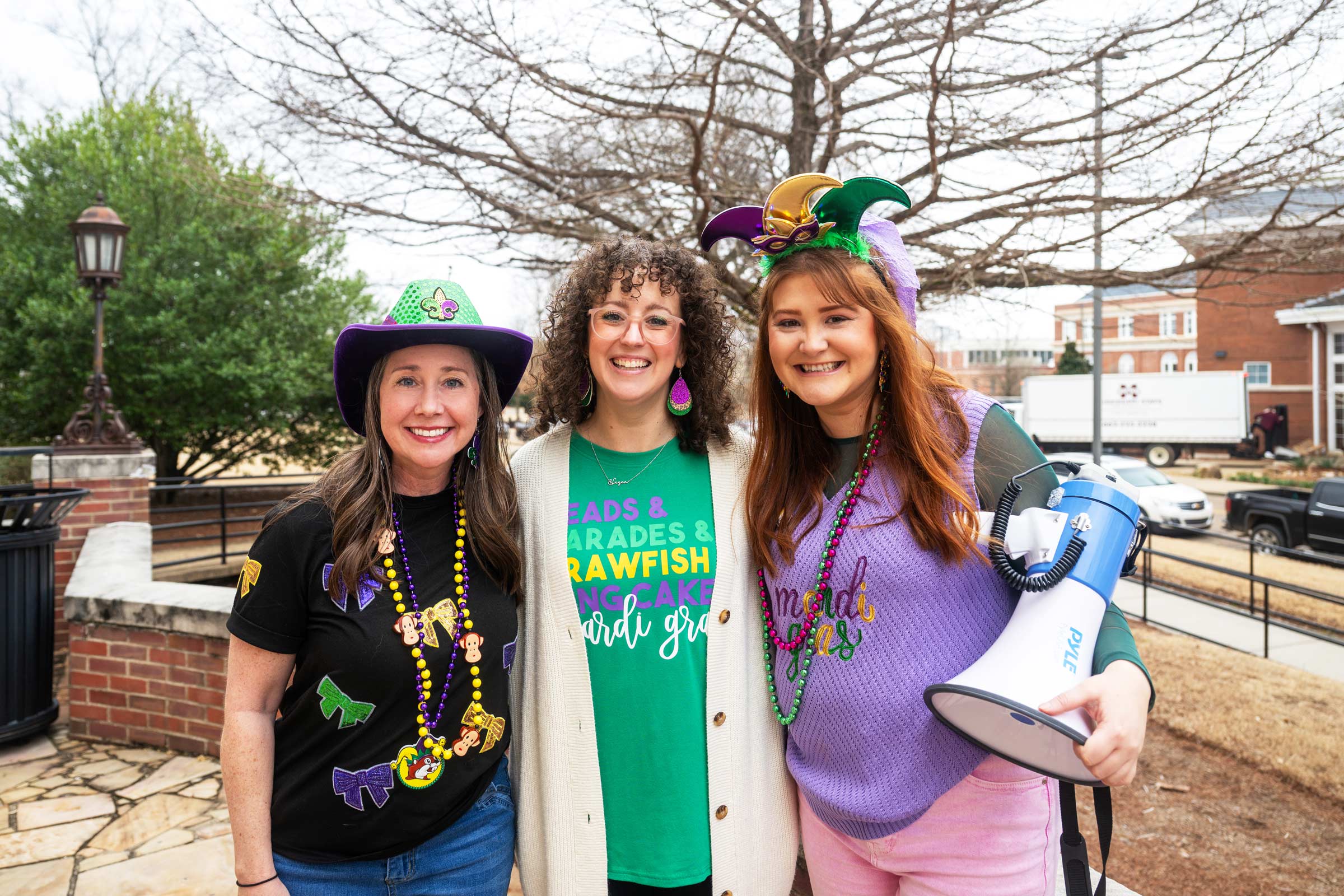 Graduate School staff Dr. Lindsey Shelton, Rachel Jenkins, and Meghan Wolf welcome the campus community to "Mardi Grad"- the grad school's annual Mardi Gras inspired celebration inside McGruder Hall. Students, faculty, and staff were treated to traditional festivities such as gumbo, moon pies, beds, and king cake. 