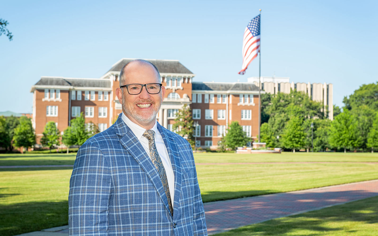 Environmental photo of Christopher Boone in front of Lee