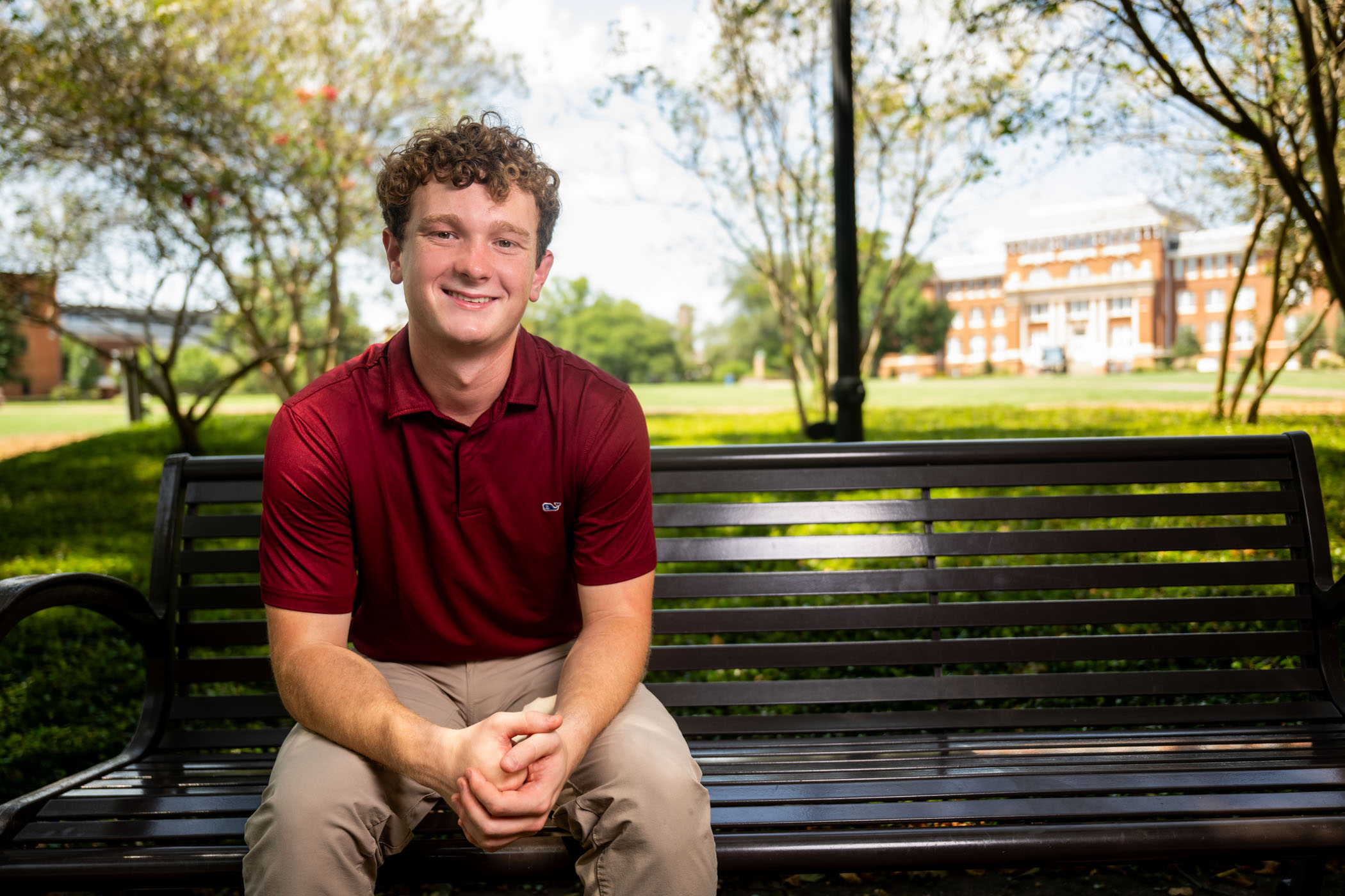 Young man sitting on a bench