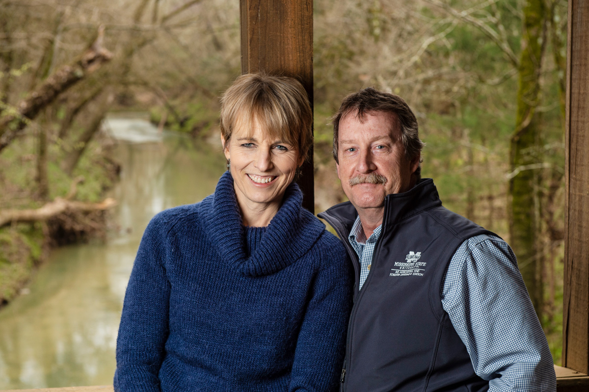 Leslie and Wes Burger, pictured in an outdoor setting.