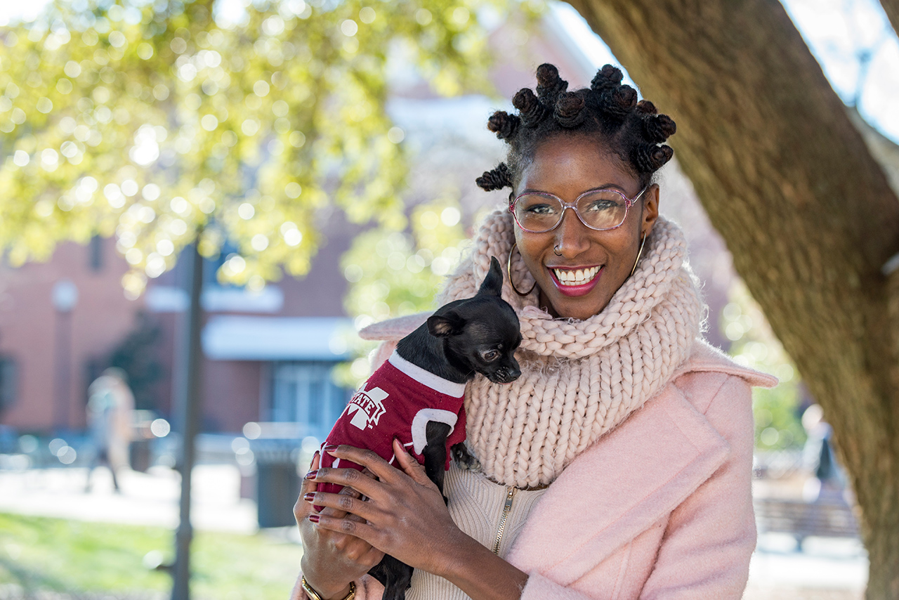 Katie Huston and her chihuahua Bella at the Drill Field