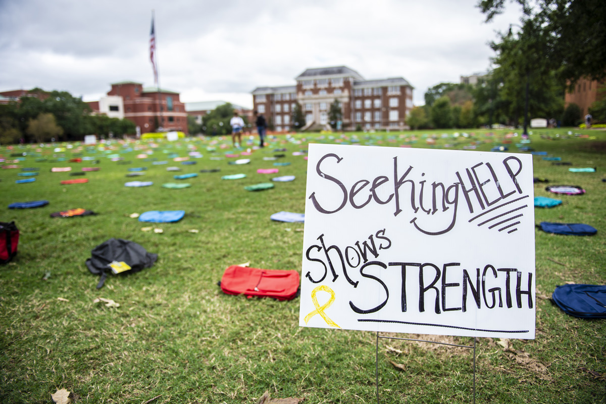 A display of backpacks line the Drill Field to remember college students who have died from suicide.