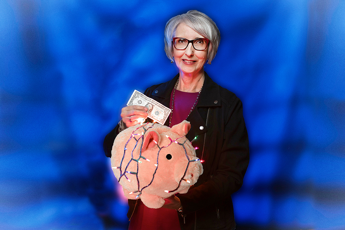 Susan Cosgrove holds a festive piggy bank.