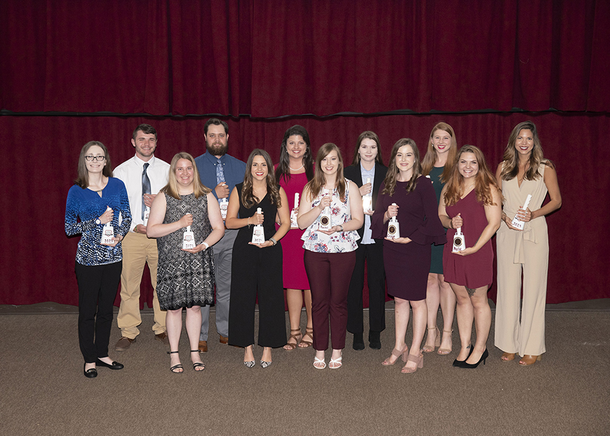 The MSU College of Veterinary Medicine is awarding 12 incoming doctor of veterinary medicine students with prestigious Bardsley Scholarships. The group of Bardsley Scholars includes, front row, from left: Kristin Miller of West Columbia, South Carolina; Grace Shields of Allegan County, Michigan; Anabel DeBruhl of Starkville; Rachel Claus of Green County, Ohio; Cassandra Barber of Monogalia County, West Virginia; and Kylie Fisher of Harrison County, West Virginia; back row, from left: Brady Brown of Lawrenceburg, Tennessee; Caleb Glover of Greenville; Emily Vowell of Taylorsville; Caroline Coussens of Little Rock, Arkansas; Hannah Kruse of New Haven, Missouri; and Julie Robinson of Greenwood, South Carolina. (Photo by Tom Thompson)