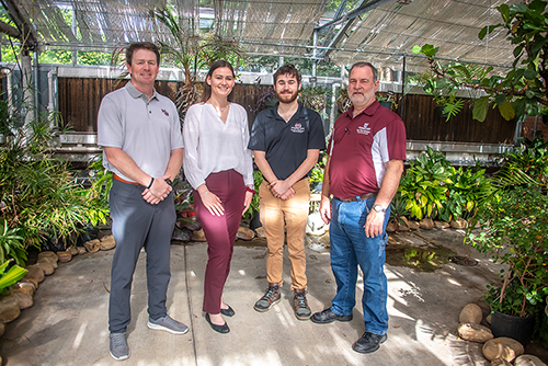 Pictured from left are Will Staggers, MSU Foundation director of development; Madelyn Gresham, a spring 2024 graduate from Naperville, Illinois, who served as 2023-24 MSU Horticulture Club president; Wesley Rainey, a spring 2024 graduate from Hattiesburg who served as the 2023-24 club greenhouse manager; and Richard Harkess, club faculty adviser, in the Dorman Hall greenhouse.