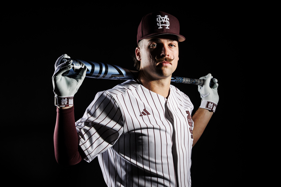 baseball player with bat on shoulders