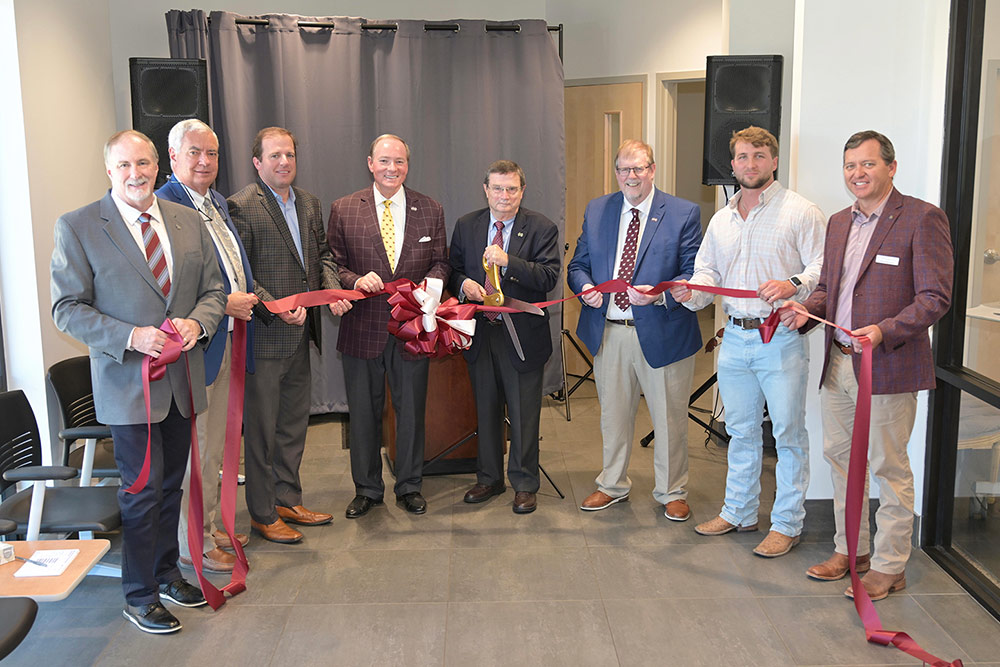 Celebrating a ribbon-cutting ceremony Aug. 17 for the MSU College of Veterinary Medicine’s newly renovated and expanded Animal Emergency & Referral Center are, from left to right, Associate Dean Ron McLaughlin, Assistant Dean for Clinical Services Joey Burt, Sen. Josh Harkins, MSU President Mark E. Keenum, CVM Dean Kent Hoblet, Vice President for the Division of Agriculture, Forestry and Veterinary Medicine Keith Coble, ArCon Project Manager Wade Gibson, and Machado Patano Architects CEO and Principal David Machado.