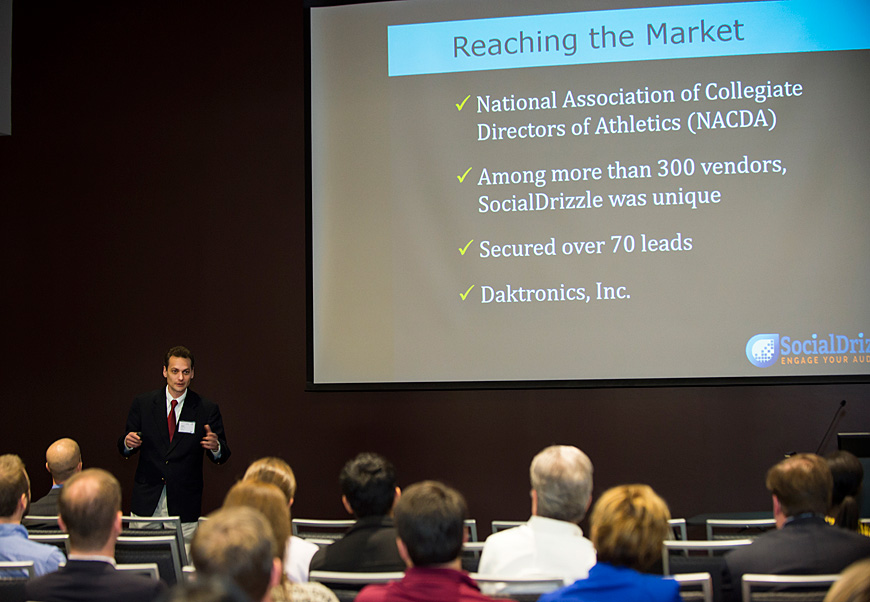 Associate professor John Edwards, Social Drizzle cofounder and CEO, presented his social media product Thursday during MaroonXpo, a MSU entrepreneurship program taking place at the Mill at MSU Conference Center. (Photo by Russ Houston)