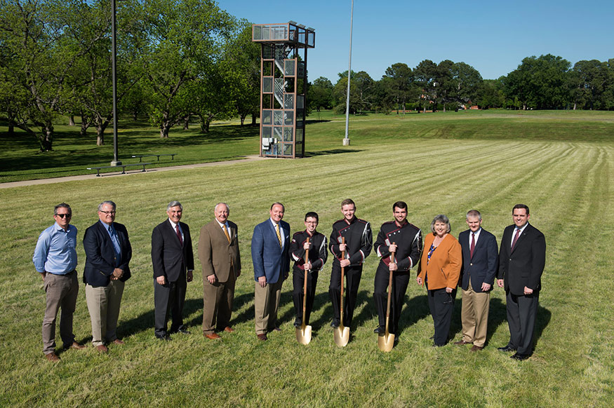 Celebrating a groundbreaking ceremony Monday [April 30] for a new synthetic turf practice field for the Famous Maroon Band were Principal and Owner of Allred Stolarski Architects Hoppy Allred; MSU Director for Planning, Design and Construction Tim Muzzi; MSU Professor and Head of the Department of Music Barry Kopetz; College of Education Dean Richard Blackbourn; MSU President Mark E. Keenum; Drum Majors Jacob T. Baker of Falkville, Alabama, Jacob S. Lanier of Marietta, Georgia, and Reece G. Paulk of Ruth; Director of Bands Elva Kaye Lance; Associate Director of Bands Cliff Taylor; and Associate Director of Bands Craig Aarhus. (Photo by Megan Bean) 