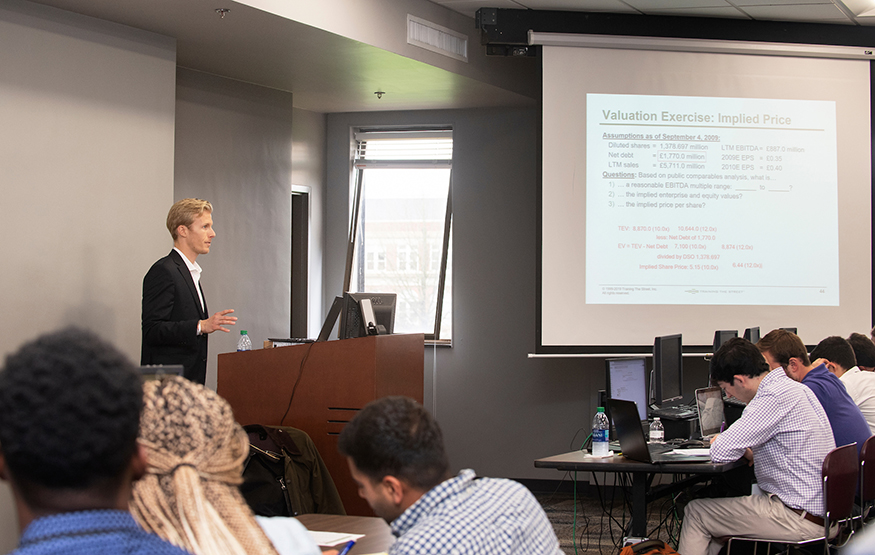 Zachary Beukema leads a Training the Street workshop for Mississippi State College of Business students. The workshop teaches students skills that will help them succeed at the highest levels of finance. (Photo by Beth Wynn)