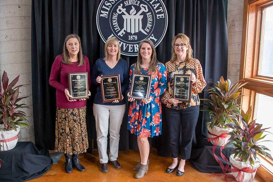 Staff award recipients include (left to right): Karen Brasher, Charlsie Halford, Jessica Myers and Susan Blanton. 
