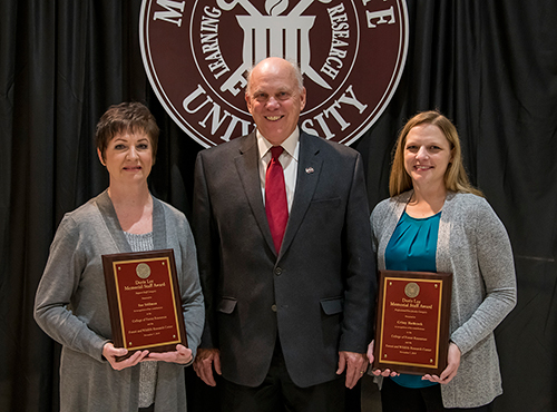 The College of Forest Resources dean is pictured with two award-winning staff members