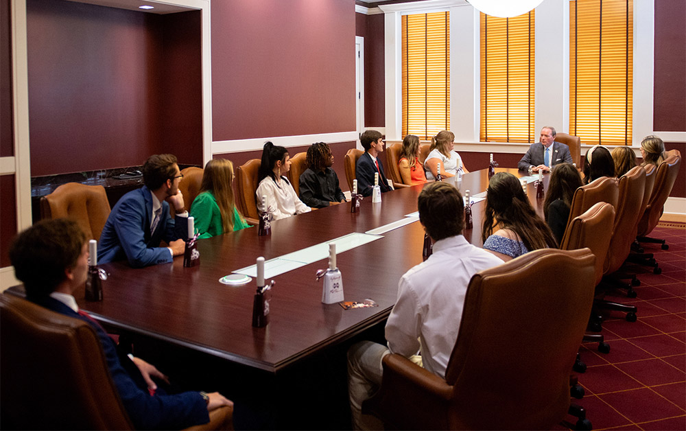 MSU President Mark E. Keenum visits with a group of Community College Presidential Scholars