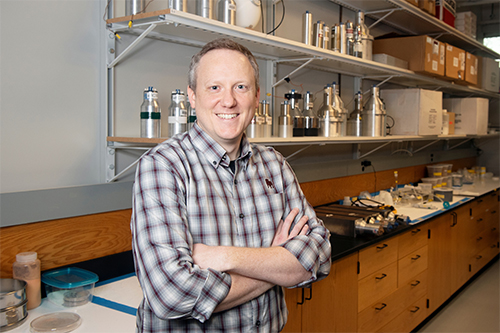 Portrait of Ben Crider in a lab at MSU