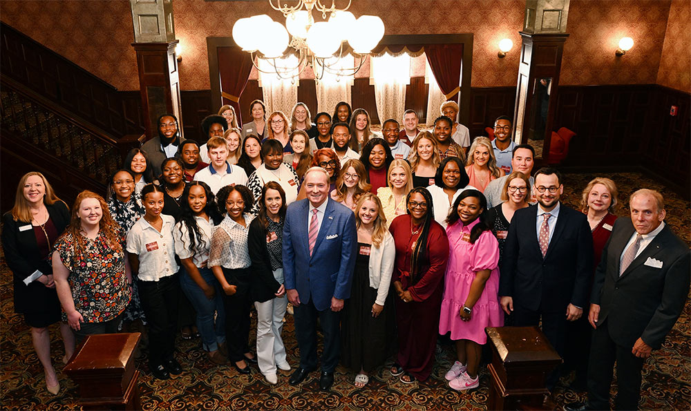 Mississippi State University-Meridian’s inaugural Accelerated Master of Science in Nursing cohort pictured with MSU leaders and community supporters on Aug. 5. (Photo by Marianne Todd)