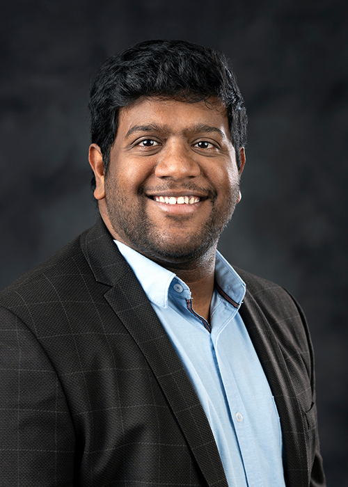 Studio portrait of Mahesh Gangishetty