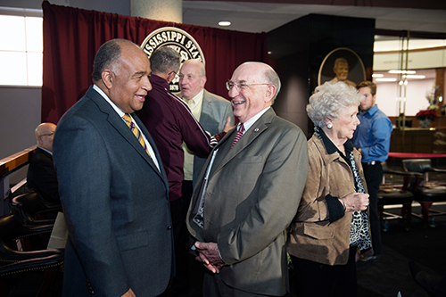 C.D. Smith (left), president of the Mississippi Institutions of Higher Learning Board of Trustees, visits with John F. Marszalek, Ulysses S. Grant Association managing editor and executive director, during Thursday’s [Nov. 30] ceremony celebrating the opening of the new addition to MSU’s Mitchell Memorial Library. (Photo by Megan Bean)