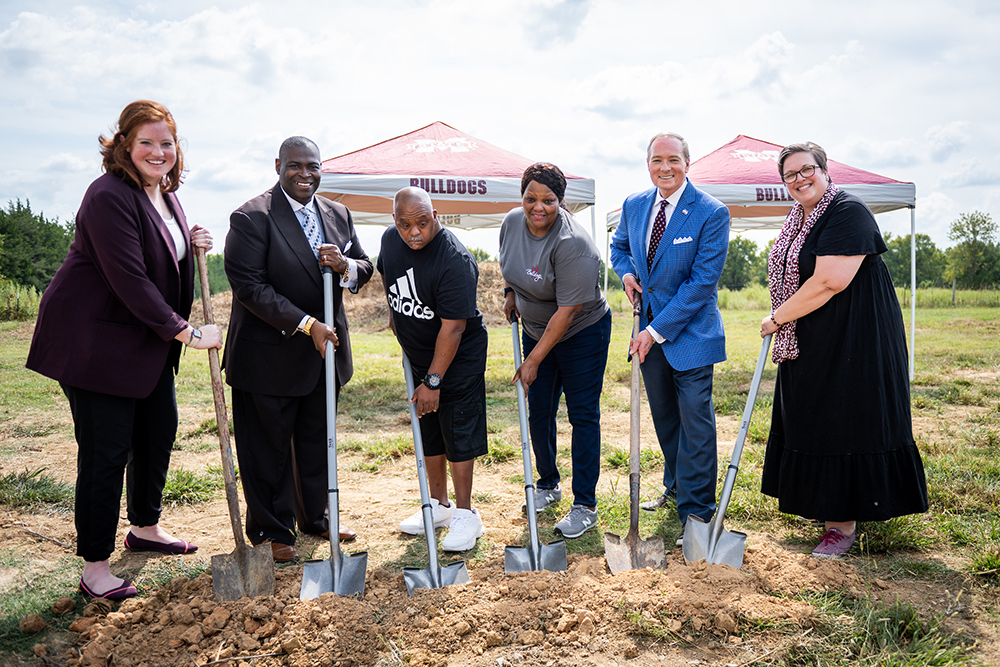 University representatives and community members break ground on the 15th Maroon Edition Habitat for Humanity house.