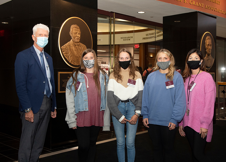 Pictured standing in front of MSU's Ulysses S. Grant Presidential Library are Peter Ryan, MSU associate provost for academic affairs and dean of the Graduate School; Eupora High School students Presley Cummings, Zada Hood and Patsy Herard; and Eupora High School librarian Cala Tabb.