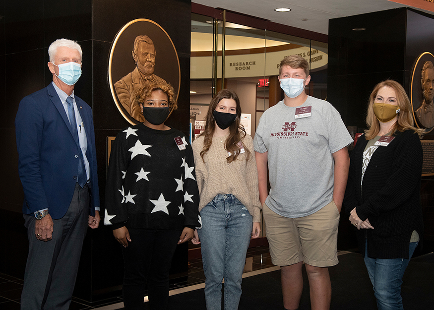 Pictured standing in front of MSU's Ulysses S. Grant Presidential Library are Peter Ryan, MSU associate provost for academic affairs and dean of the Graduate School; Houston High School students Telysa Guido, Alexis Ellison and Hayden Crump; and Houston High School librarian Miriam Garner.