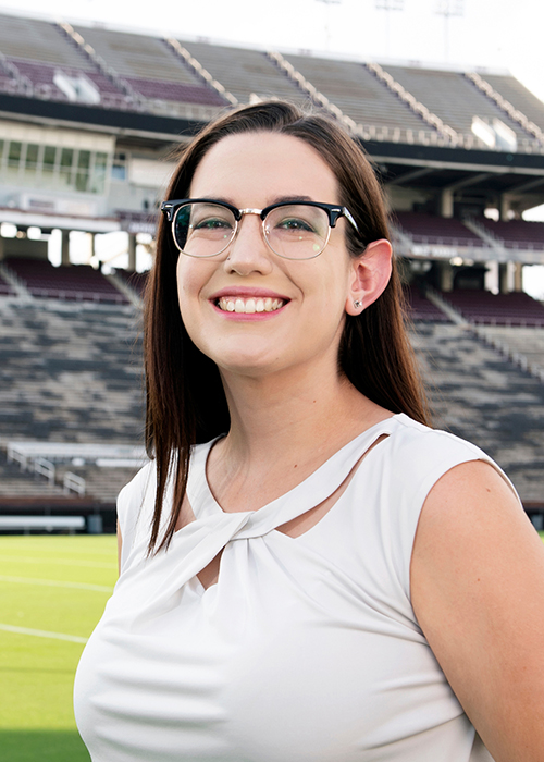 Senior maid Serena Liles smiles while standing in Davis Wade Stadium for an MSU 2021 Homecoming Court photo shoot.