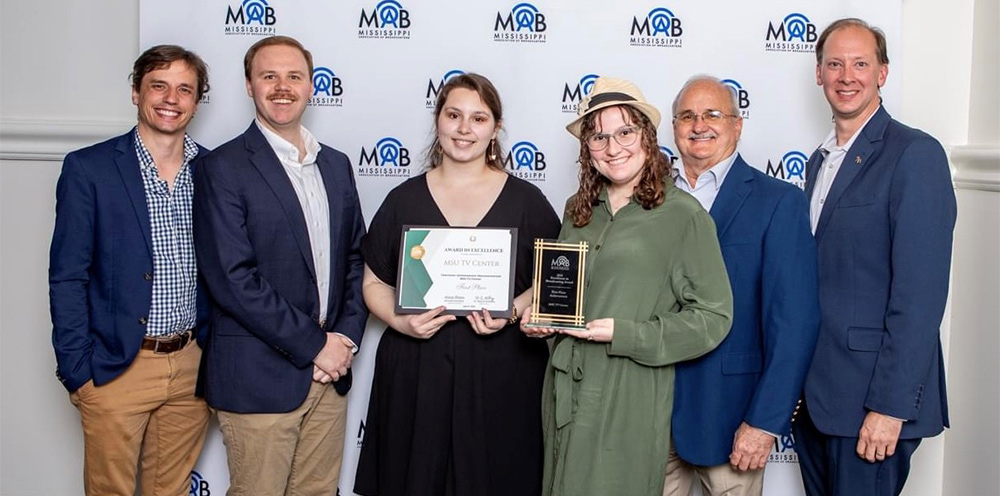 Mississippi State’s University Television Center staff members at the Mississippi Association of Broadcasters Excellence in Broadcasting Awards ceremony. From left to right: James Parker, senior documentary and special projects producer; Brett Thornburg, video producer; Olivia Aylsworth, video producer; Hannah Baker, video producer; Don Warren, senior producer; and David Garraway, director.