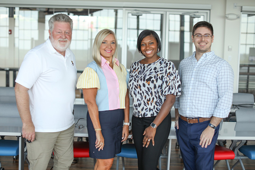 A group photo of Reed Mosher, Pattie Duett, Tasha Bibb and Ryan Gilbrech