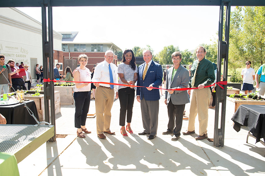 Celebrating a ribbon cutting ceremony Oct. 15 at the MSU Community Garden are (l-r) Dean Angi Elsea Bourgeois of MSU’s College of Architecture, Art and Design; Dean George Hopper of MSU’s College of Agriculture and Life Sciences; Student Association President Mayah Emerson; MSU President Mark E. Keenum; Associate Professor of Landscape Architecture Cory Gallo; and Vice President for Agriculture, Forestry and Veterinary Medicine Gregory Bohach. (Photo by Megan Bean)