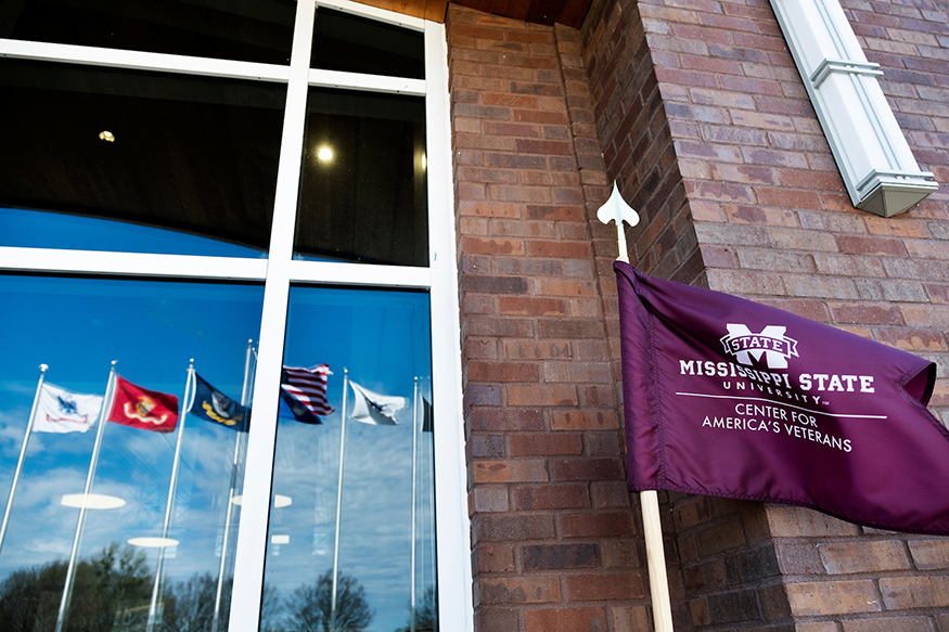 Flags on display in front of Nusz Hall